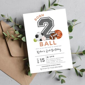 May include: A birthday invitation with a gray number two and the words "Born 2 Ball" in orange. The number two is decorated with a soccer ball, a baseball, and a football. The invitation is for Kaden's 2nd birthday party on October 15th at 2pm. The address and contact information are included.