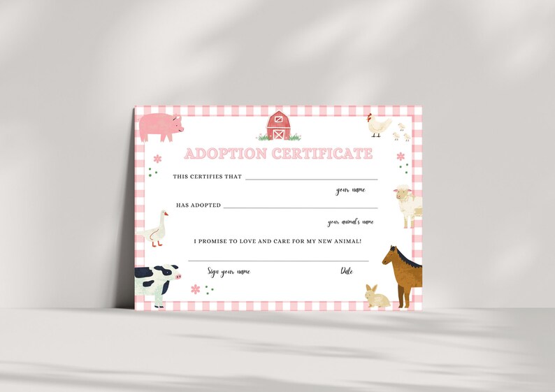 May include: Pink and white adoption certificate with a gingham pattern. The certificate has spaces to fill in the name of the person adopting and the name of the animal adopted. The certificate also includes a barn, a pig, a goose, a cow, a horse, a sheep, a chicken, and a bunny.
