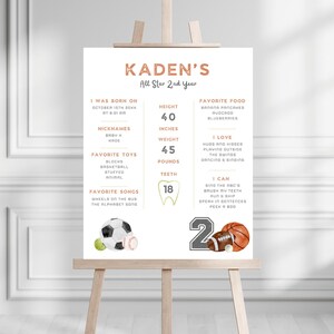 May include: A white printable poster with a brown and orange design. The poster is titled "Kaden's All Star 2nd Year". It includes information about Kaden's height, weight, favorite foods, and other details. The poster also features illustrations of a soccer ball, baseball, basketball, and football.