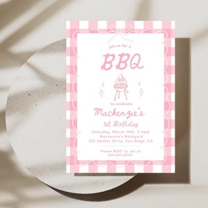 May include: A pink and white gingham patterned invitation for a BBQ to celebrate Mackenzie's 1st birthday. The invitation includes a drawing of a grill with flames and stars. The text reads "Join us for a BBQ to celebrate Mackenzie's 1st Birthday. Saturday, March 19th, 2-4pm Mackenzie's Backyard 123 Harbor Drive, San Diego, CA. Please RSVP to Jen at 544.455.6767."