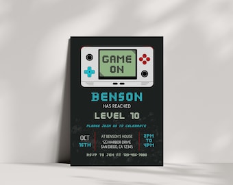 May include: A black invitation card with a pixelated handheld game console graphic. The text "GAME ON" is displayed on the screen. The invitation announces "BENSON HAS REACHED LEVEL 10" and includes event details: date, time, and location.