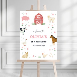 May include: Welcome to Olivia's 2nd Birthday party sign with a red barn, farm animals, and pink flowers. The sign says "Welcome to Olivia's 2nd Birthday August 8th, 20XX".