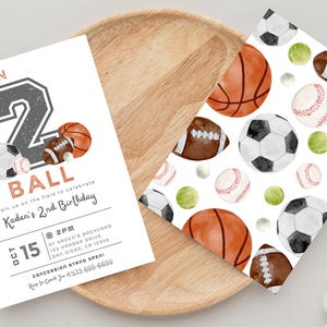 May include: A white invitation with a gray number "2" and the words "Born 2 Ball" in a black and white sports theme. The invitation is for Kaden's 2nd birthday party. The text on the invitation reads "Join us on the field to celebrate Kaden's 2nd Birthday. Oct 15 @ 2PM at Kaden's Backyard 123 Harbor Drive San Diego, CA 12345 Concession Stand Open!"