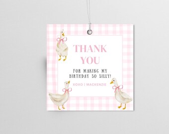 May include: Pink and white gingham thank you tag with the text "Thank You for making my birthday so silly! xoxo Mackenzie" and three white ducks with pink bows.