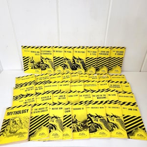 May include: A collection of vintage Cliffs Notes study guides. The books have yellow covers with black diagonal stripes and illustrations. Titles include "Romeo and Juliet," "The Odyssey," and "Huckleberry Finn." The books are arranged in neat rows.