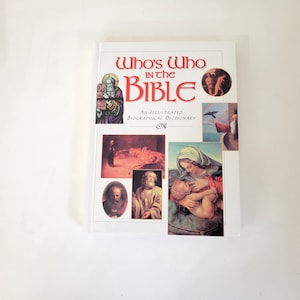 May include: A white book with the title "Who's Who in the Bible: An Illustrated Biographical Dictionary". The cover features several colorful illustrations of biblical figures.