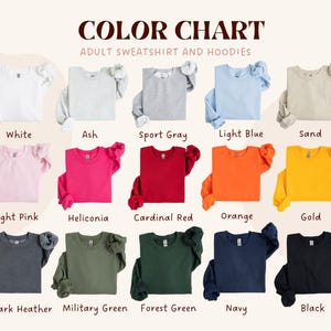May include: Color chart of adult sweatshirts and hoodies in various colors. The chart includes white, ash, sport gray, light blue, sand, light pink, heliconia, cardinal red, orange, gold, dark heather, military green, forest green, navy, and black.