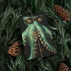 May include: A green octopus with goggles wrapped in brown twine, on a black background with a green and gold pattern. The octopus is wearing goggles and has a steampunk aesthetic.