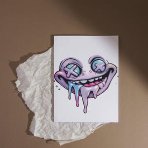 May include: A cartoon illustration of a purple and pink creature with a wide smile and dripping blue and pink goo. The creature has large eyes with white X's over them.