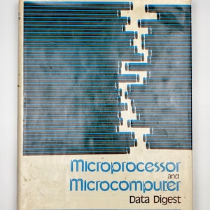 May include: A vintage book titled "Microprocessor and Microcomputer Data Digest." The cover features a blue and black design of horizontal lines and a broken vertical pattern. The authors' names, Walter H. Buchsbaum and Gina Weissenberg, are printed at the bottom.