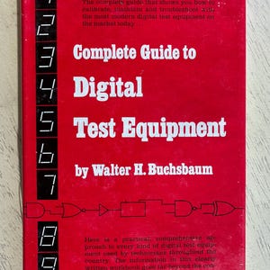 May include: A red book titled "Complete Guide to Digital Test Equipment" by Walter H. Buchsbaum. The cover features white text and digital display graphics. The book provides information on digital test equipment.
