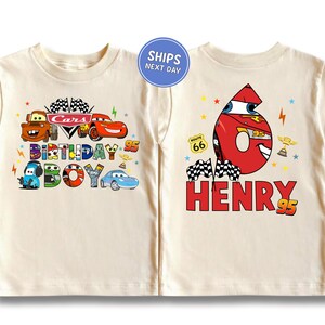 Two white t-shirts with colorful designs and text related to the character "Cars" and a birthday boy named Henry.