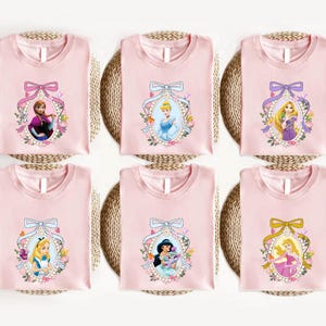 a set of six disney princess t - shirts