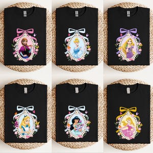 a bunch of tshirts with princesses on them
