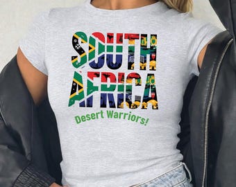 Camiseta corta de mujer Sudáfrica Fútbol 2026 ¡Guerreras del Desierto! Camiseta raglán para aficionadas al fútbol Camiseta para aficionadas al fútbol Copa de la Nación Camiseta corta para el verano