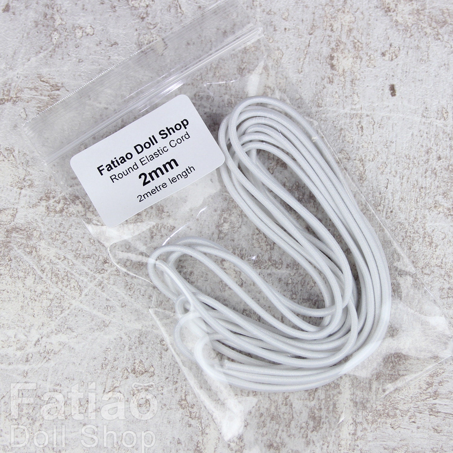 Elastic cord for stringing dolls. - PRODOLLS