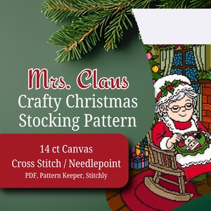 May include: A Christmas stocking cross-stitch pattern featuring Mrs. Claus in a rocking chair, with a fireplace and gifts in the background. The text reads "Mrs. Claus Crafty Christmas Stocking Pattern" and "14 ct Canvas Cross Stitch / Needlepoint".