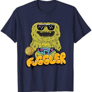 May include: A navy blue t-shirt with a cartoon illustration of a furry creature wearing sunglasses, a gold chain, and a colorful swimsuit. The creature is labeled "FUGGLEF" in yellow bubble letters.