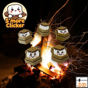 May include: Five brown and white s'more-shaped clicker toys with smiling faces and metal ball chains. Each toy features a brown graham cracker top, a white marshmallow centre, and a brown base. The text S'more Clicker appears in the top left corner.