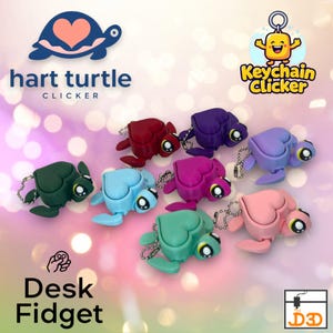May include: A collection of colorful heart-shaped turtle desk fidget toys. Each turtle has a keychain and is in a different color, including green, blue, pink, purple, and red. The text "hart turtle clicker" and "Desk Fidget" are also visible.