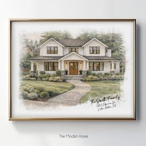 May include: Watercolor painting of a two-story white house with a dark roof, framed in gold. The house has multiple windows, a front porch, and a walkway leading to the entrance. The text reads "The Smith Family".