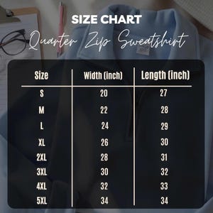 May include: A size chart for a quarter-zip sweatshirt, with measurements in inches. The chart lists sizes S through 5XL, with corresponding width and length measurements. The sweatshirt is light blue.