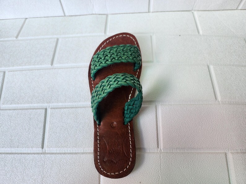 moroccan sandals, handmade sandals, boho sandals women, braided sandals, leather slides women, green summer shoes, green leather sandals, open toe sandals, casual leather slides, artisan sandals, flat sandals women, leather footwear, ethnic leather sandals, barefoot sandals, hippie shoes women, vacation sandals, moroccan shoes, resort sandals women, leather slippers, rustic sandals, green boho sandals, earthy tone sandals, gypsy sandals, slip on leather flats, summer shoes women, handmade sandal