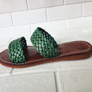 moroccan sandals, handmade sandals, boho sandals women, braided sandals, leather slides women, green summer shoes, green leather sandals, open toe sandals, casual leather slides, artisan sandals, flat sandals women, leather footwear, ethnic leather sandals, barefoot sandals, hippie shoes women, vacation sandals, moroccan shoes, resort sandals women, leather slippers, rustic sandals, green boho sandals, earthy tone sandals, gypsy sandals, slip on leather flats, summer shoes women, handmade sandal