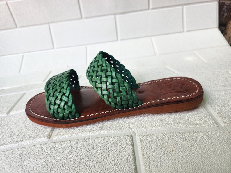 moroccan sandals, handmade sandals, boho sandals women, braided sandals, leather slides women, green summer shoes, green leather sandals, open toe sandals, casual leather slides, artisan sandals, flat sandals women, leather footwear, ethnic leather sandals, barefoot sandals, hippie shoes women, vacation sandals, moroccan shoes, resort sandals women, leather slippers, rustic sandals, green boho sandals, earthy tone sandals, gypsy sandals, slip on leather flats, summer shoes women, handmade sandal