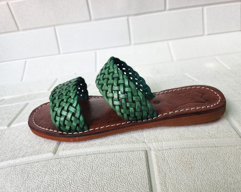 moroccan sandals, handmade sandals, boho sandals women, braided sandals, leather slides women, green summer shoes, green leather sandals, open toe sandals, casual leather slides, artisan sandals, flat sandals women, leather footwear, ethnic leather sandals, barefoot sandals, hippie shoes women, vacation sandals, moroccan shoes, resort sandals women, leather slippers, rustic sandals, green boho sandals, earthy tone sandals, gypsy sandals, slip on leather flats, summer shoes women, handmade sandal