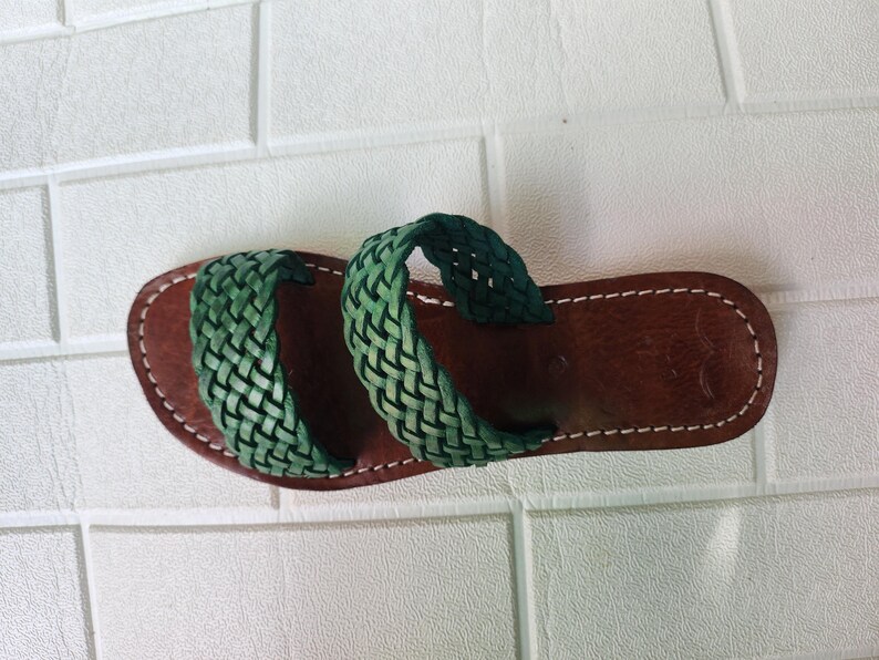 moroccan sandals, handmade sandals, boho sandals women, braided sandals, leather slides women, green summer shoes, green leather sandals, open toe sandals, casual leather slides, artisan sandals, flat sandals women, leather footwear, ethnic leather sandals, barefoot sandals, hippie shoes women, vacation sandals, moroccan shoes, resort sandals women, leather slippers, rustic sandals, green boho sandals, earthy tone sandals, gypsy sandals, slip on leather flats, summer shoes women, handmade sandal