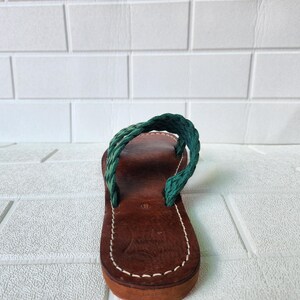 moroccan sandals, handmade sandals, boho sandals women, braided sandals, leather slides women, green summer shoes, green leather sandals, open toe sandals, casual leather slides, artisan sandals, flat sandals women, leather footwear, ethnic leather sandals, barefoot sandals, hippie shoes women, vacation sandals, moroccan shoes, resort sandals women, leather slippers, rustic sandals, green boho sandals, earthy tone sandals, gypsy sandals, slip on leather flats, summer shoes women, handmade sandal