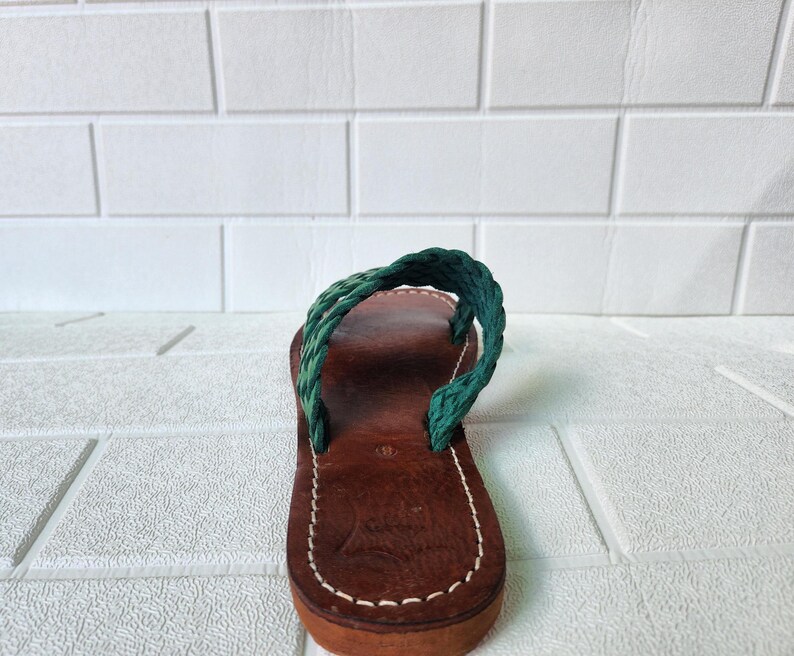 moroccan sandals, handmade sandals, boho sandals women, braided sandals, leather slides women, green summer shoes, green leather sandals, open toe sandals, casual leather slides, artisan sandals, flat sandals women, leather footwear, ethnic leather sandals, barefoot sandals, hippie shoes women, vacation sandals, moroccan shoes, resort sandals women, leather slippers, rustic sandals, green boho sandals, earthy tone sandals, gypsy sandals, slip on leather flats, summer shoes women, handmade sandal