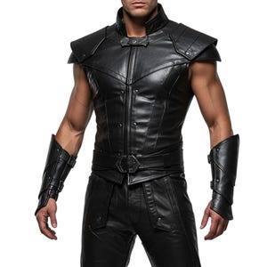May include: Black leather vest with shoulder pads, a high collar, and a belt with a buckle. The vest has a button-up front and is paired with matching leather pants and arm cuffs with buckles. The outfit is a sleek, dark design.