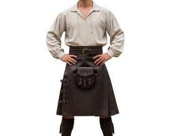 May include: A brown leather kilt with decorative buckles and a matching sporran. The kilt is paired with a beige long-sleeved shirt with a drawstring neckline. The outfit is completed with brown knee-high socks.
