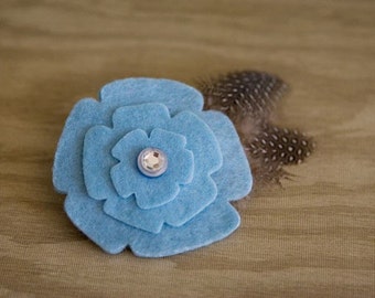 Light blue felt flower w/feathers hair clip