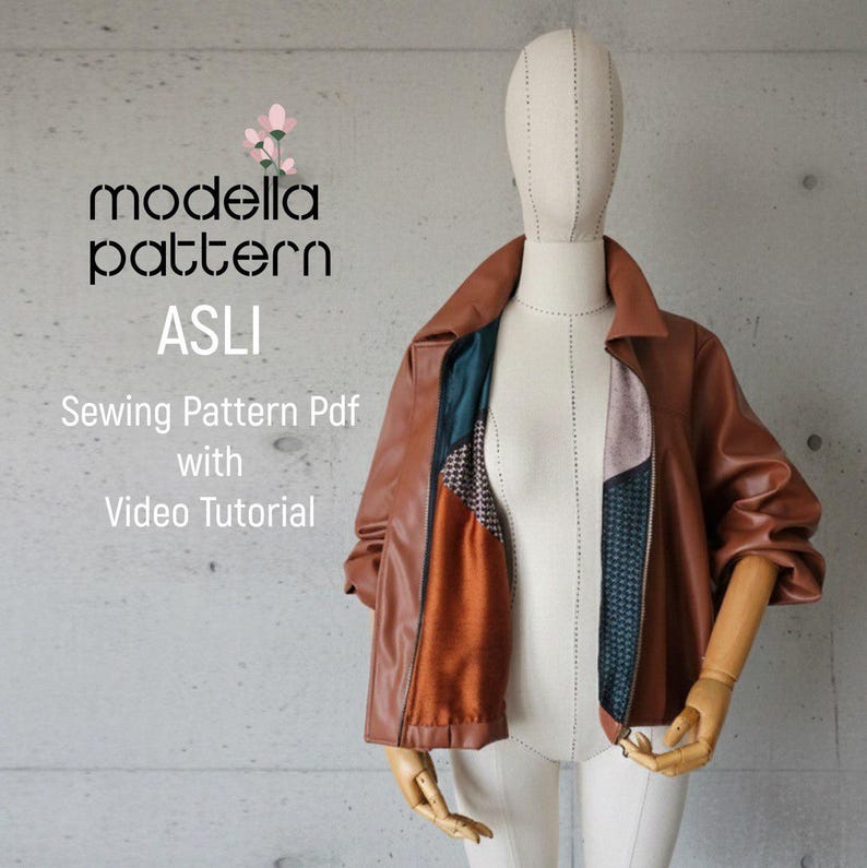 May include: A brown leather jacket with a contrasting patterned interior is displayed on a mannequin. The jacket is open, revealing the colorful lining. Text on the image reads "modella pattern ASLI Sewing Pattern Pdf with Video Tutorial."