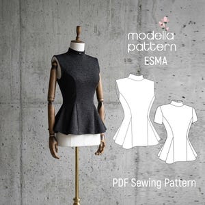 May include: A dark grey sleeveless top with a high collar and peplum design is displayed on a mannequin. The top is made of a textured fabric. The image also includes a PDF sewing pattern with the text "modella pattern ESMA".