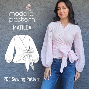 May include: A light pink wrap blouse with long puff sleeves and eyelet fabric detail. The image includes a black and white line drawing of the garment, the text "modella pattern MATILDA", and the text "PDF Sewing Pattern" on a gray background.