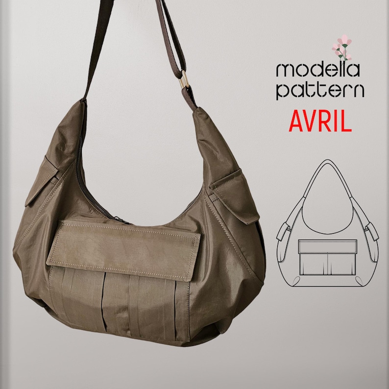 May include: A brown,  shoulder bag with a large flap pocket and a smaller pocket on the front. The bag has a long strap and a zipper closure. The bag is made of a soft, textured fabric. The image also includes a line drawing of the bag.