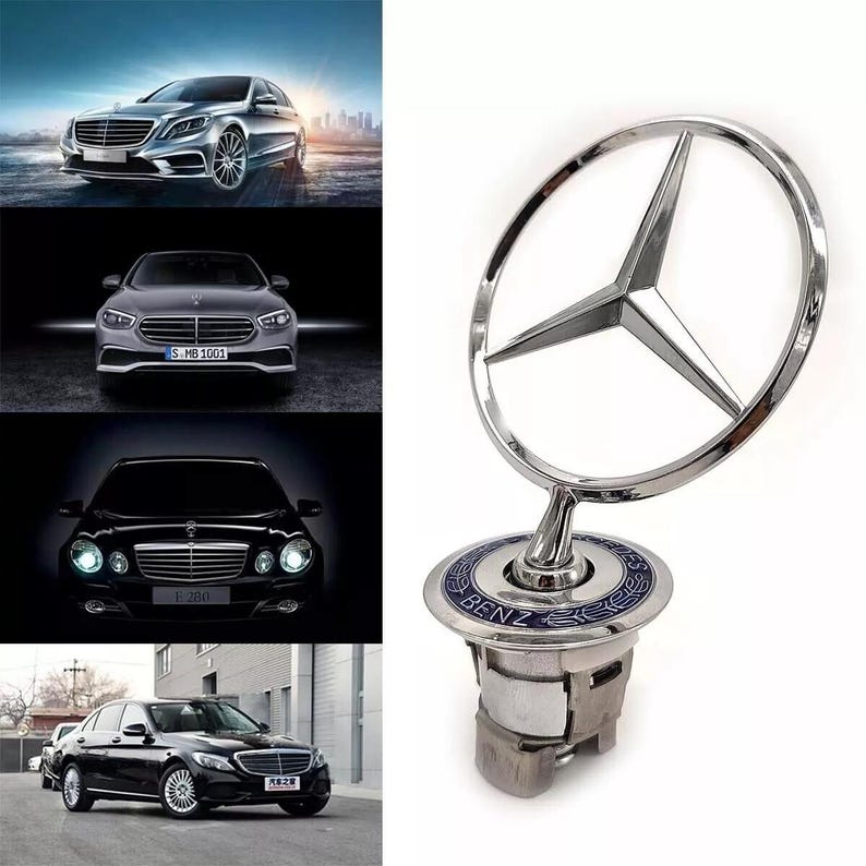 May include: A chrome Mercedes-Benz hood ornament featuring the iconic three-pointed star emblem. The ornament is mounted on a base with the word "BENZ" in blue lettering. The image also shows several Mercedes-Benz car models.