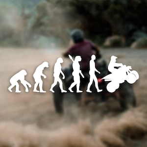 May include: A white vinyl sticker depicting the evolution of humans, ending with a person riding an ATV. The sticker is on a blurred background of a person riding an ATV.