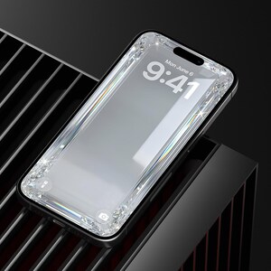 May include: A smartphone with a diamond-encrusted bezel, displaying the time as 9:41 on the screen. The phone is set against a dark, textured background with a black and silver design.
