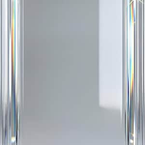 May include: A clear, diamond-faceted smartphone with a light gray background. The screen displays "Mon June 6" and "9:41" in white. The bottom has a flashlight and camera icon.
