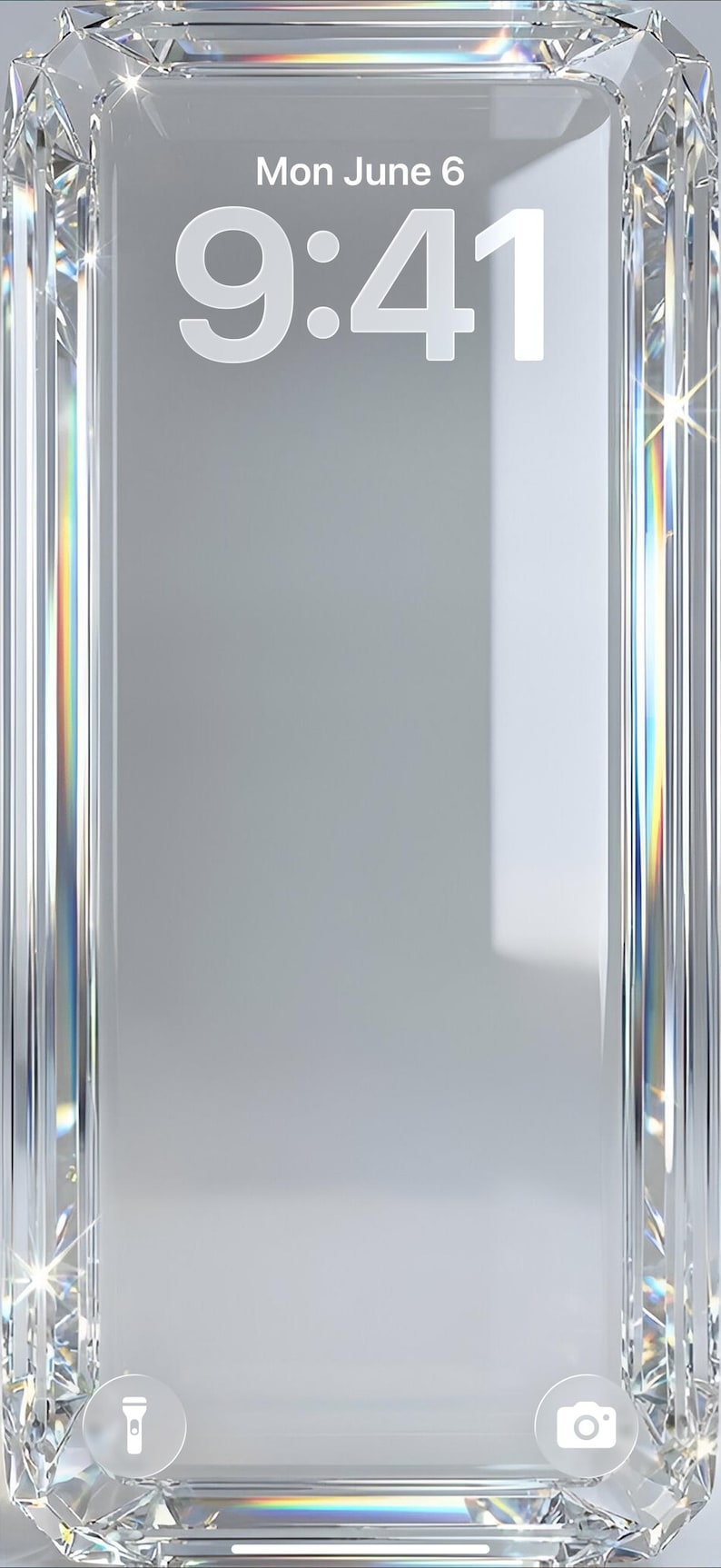 May include: A clear, diamond-faceted smartphone with a light gray background. The screen displays "Mon June 6" and "9:41" in white. The bottom has a flashlight and camera icon.