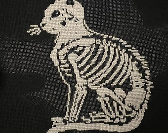 Black and white cat skeleton cross stitch wall art