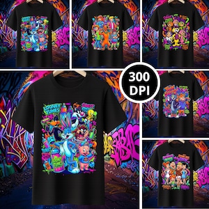 Op de afbeelding: Zwarte t-shirts met cartoonfiguren van Looney Tunes, Scooby-Doo en andere animatieseries. De shirts hebben kleurrijke graffiti-achtige ontwerpen met tekst als "Looney Tunes" en "Street Crew".