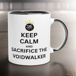 May include: White ceramic mug with a black interior and silver handle. The mug features the text "KEEP CALM AND SACRIFICE THE VOIDWALKER" in black, with a crown and graphic above the text.