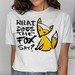 キツネは何て言う？Tシャツ、おもしろキツネ、動物好きへのギフト、人気曲の歌詞、トレンドTシャツ、かわいい漫画キツネ、ユーモラスなシャツ、ストリートウェア