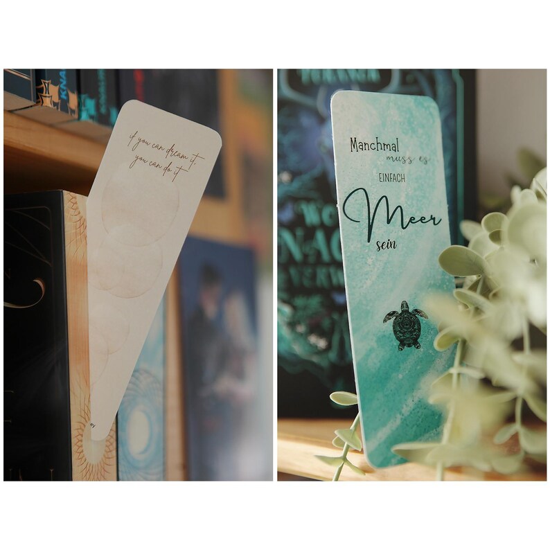 May include: Two bookmarks with inspirational quotes. The first bookmark is white with the quote "If you can dream it, you can do it". The second bookmark is blue and green with the quote "Manchmal muss es einfach Meer sein".